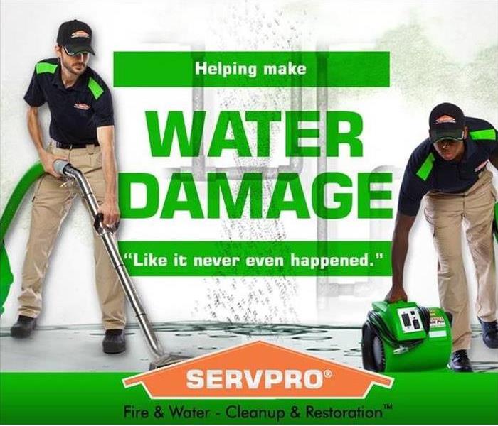 "water damage" - image of two SERVPRO technicians cleaning