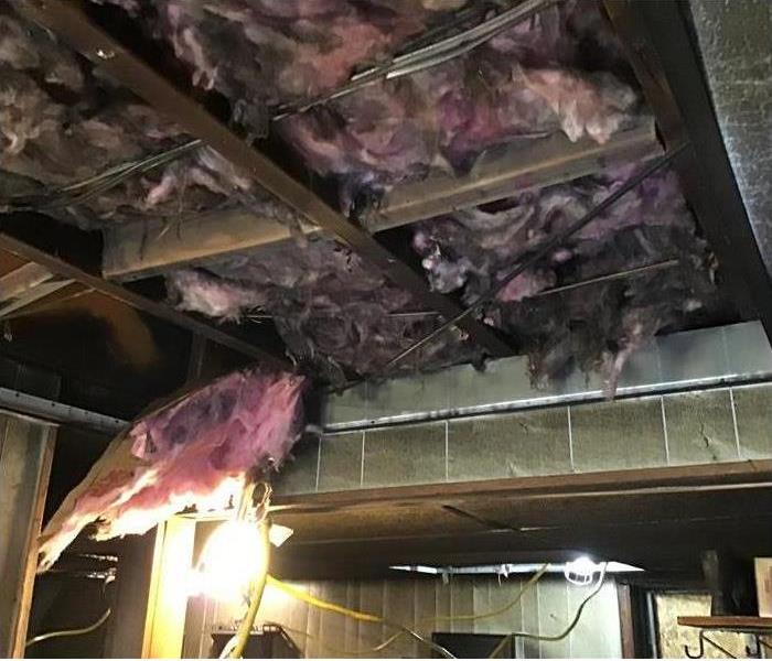fire damaged open ceiling, soot, insulation
